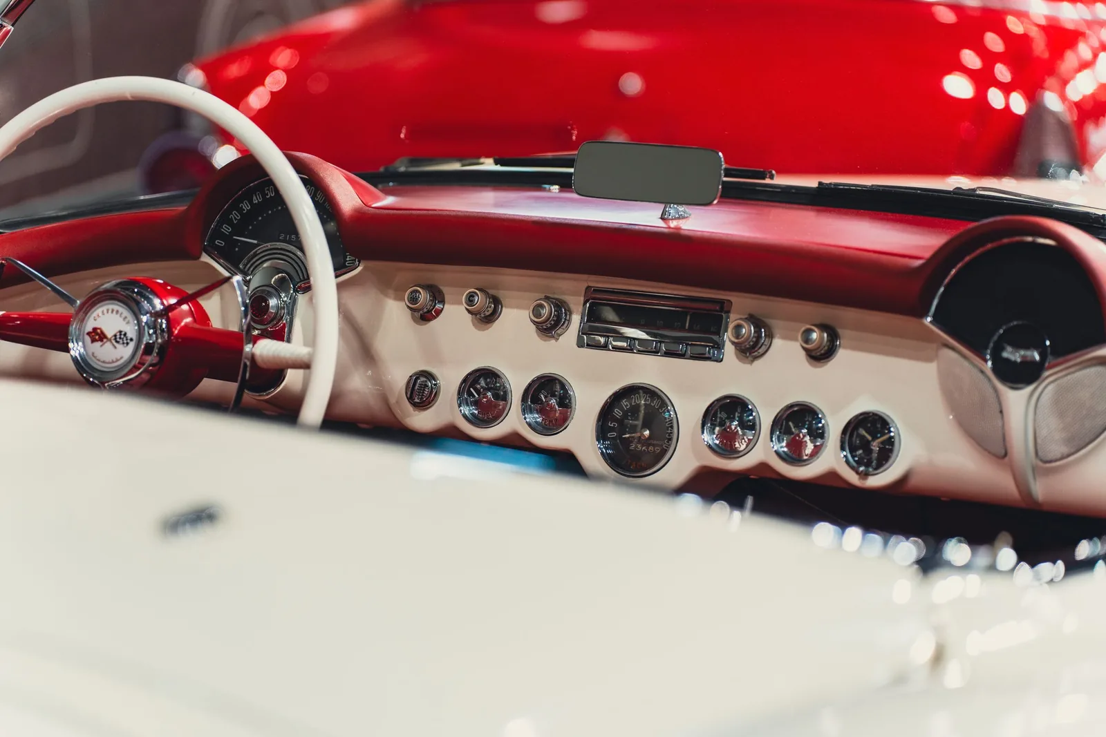 The red dashboard of the classic coupe