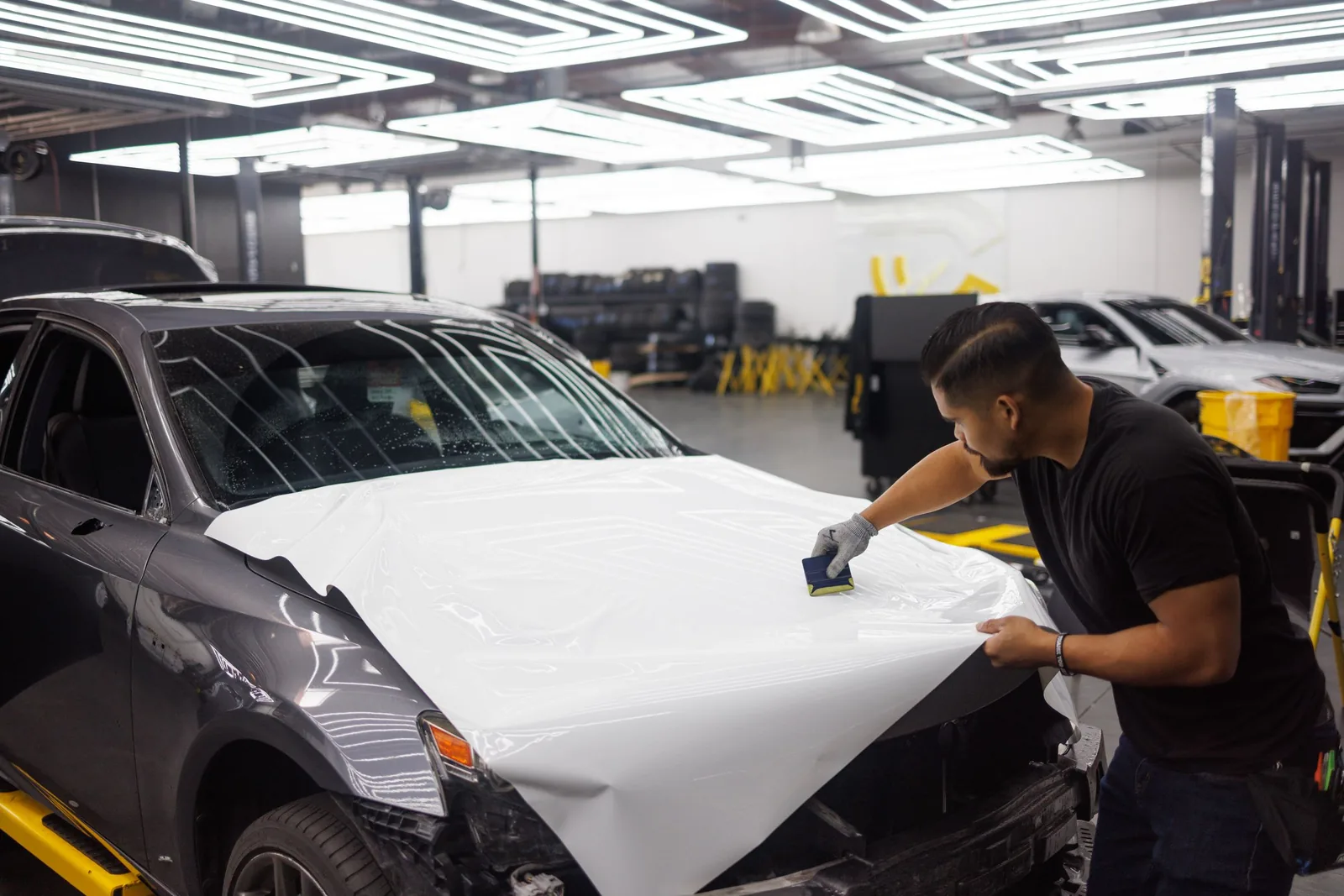 The wrap pulled tight round the edge of the bonnet